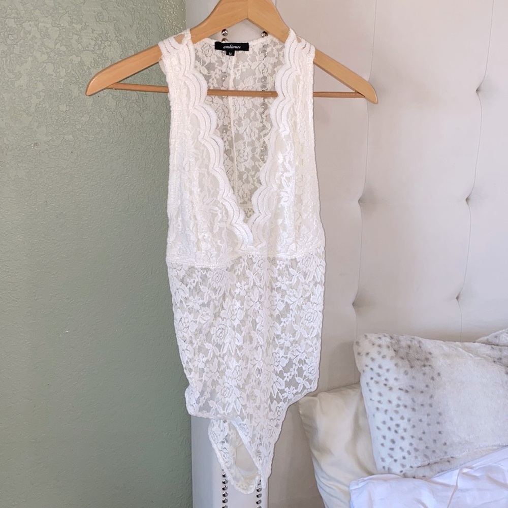 White lace bodysuit. Size M